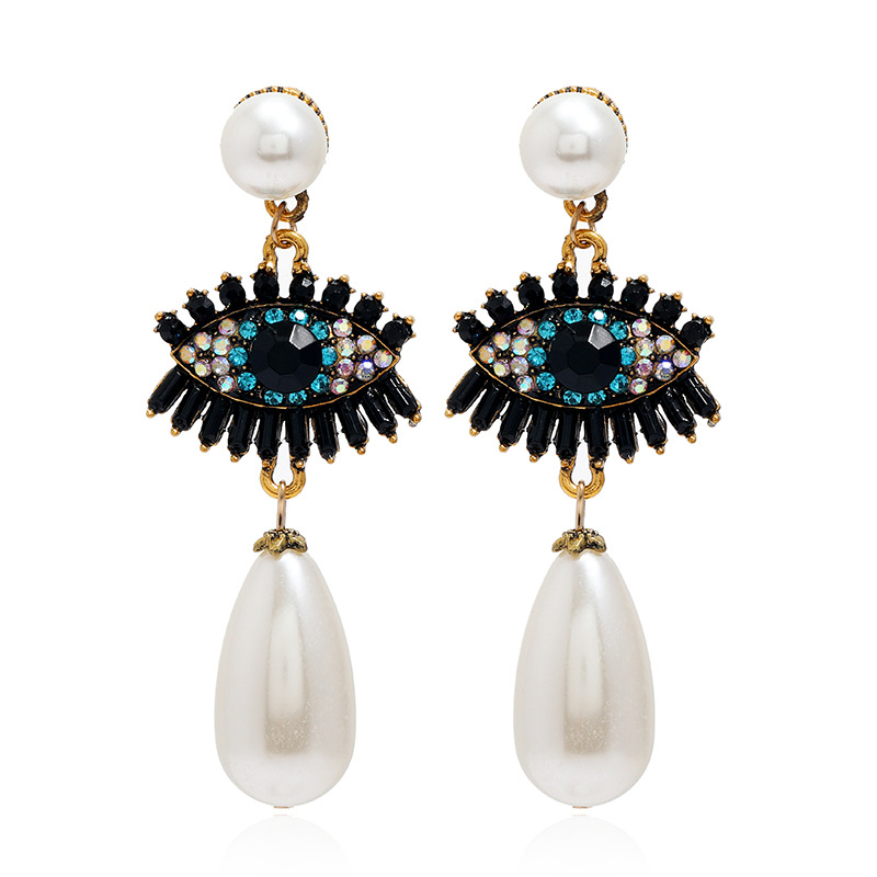 European And American Fashion Retro Bohemian Exaggerated Pearl Earrings Special Simple Creative Exaggerated Eyes Long Earrings display picture 1