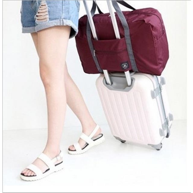 Estilo coreano fresco bolsa de viaje plegable bolsa de almacenamiento de viaje bolsa de jacquard bolsa de organización de ropa