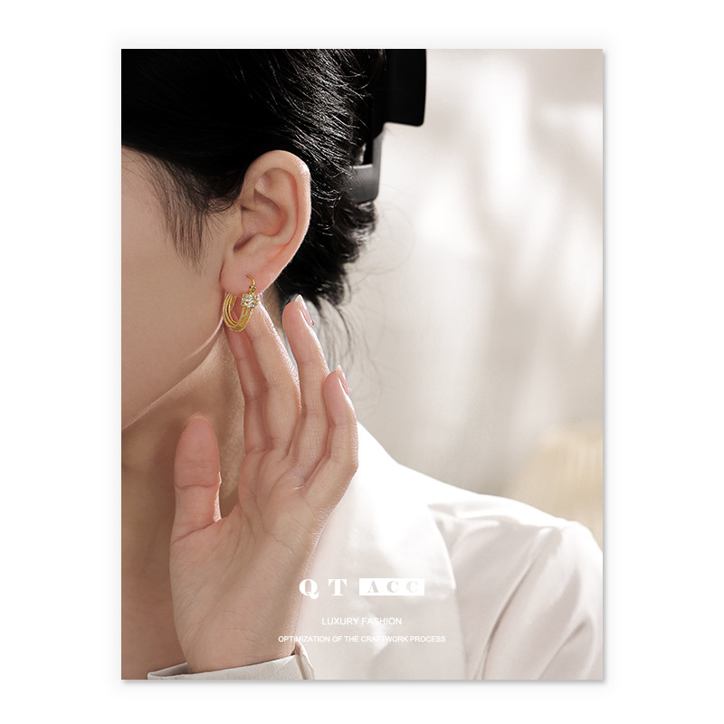 Latón chapado en oro europeo y americano ins exquisita luz de lujo zircon micro-incrustaciones de múltiples capas línea oreja hebilla pendientes de primavera y verano nuevo
