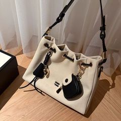 时尚同款 季风旅程托特包包女2025新款超火通勤抽绳单肩斜挎包