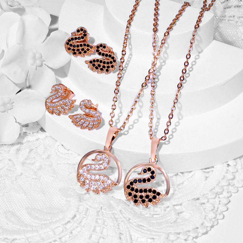 Conjunto de joyería popular transfronteriza para mujeres nuevo diseño de moda cisne aretes de bronce collar joyería colgante hermoso image 1
