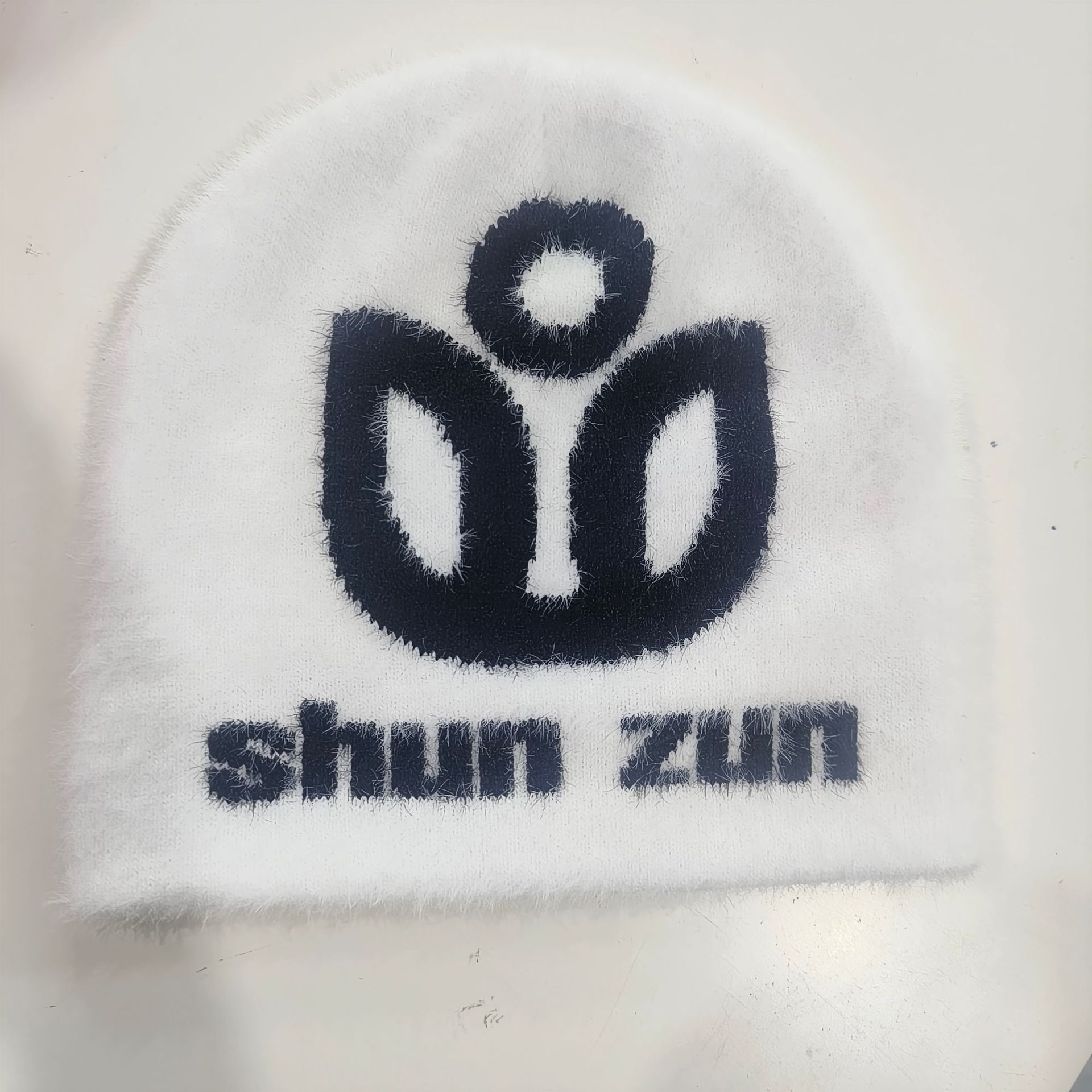 Transfronterizos nuevos puntos de imitación de visón sombrero de frijol sombrero de punto sombrero de invierno sombrero Jacquard sombrero de protección de orejas