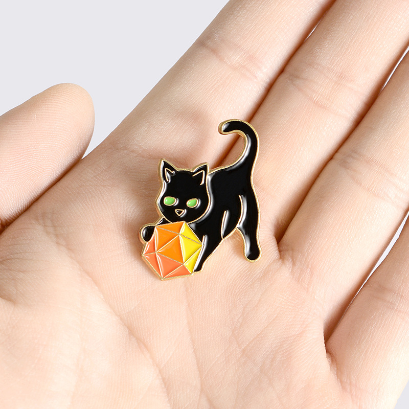 Creative Cartoon Black Cat Holding Ball Shape Alloy Brooch Clothes Badge Wholesale display picture 3