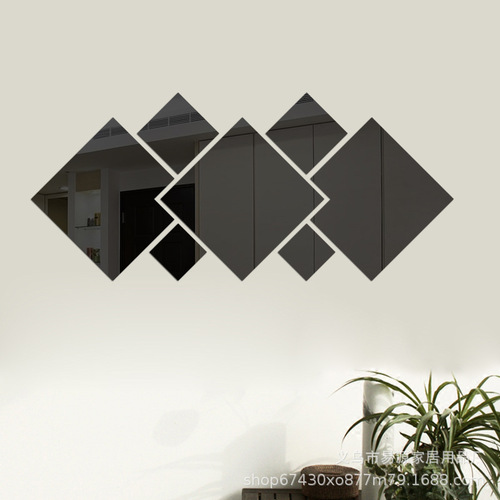 A set of seven rhombus-shaped mirror wall decals with self-adhesive backing, produced and sold by the manufacturer. Large size: 16.5cm. Small size: 4.8cm.