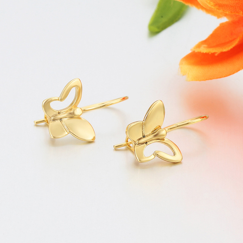 Xuping chapado 14k mariposa gancho de orejas hebilla de aleación de cobre simple Europa y América transfronteriza brillante pendientes de orejas al por mayor mujeres