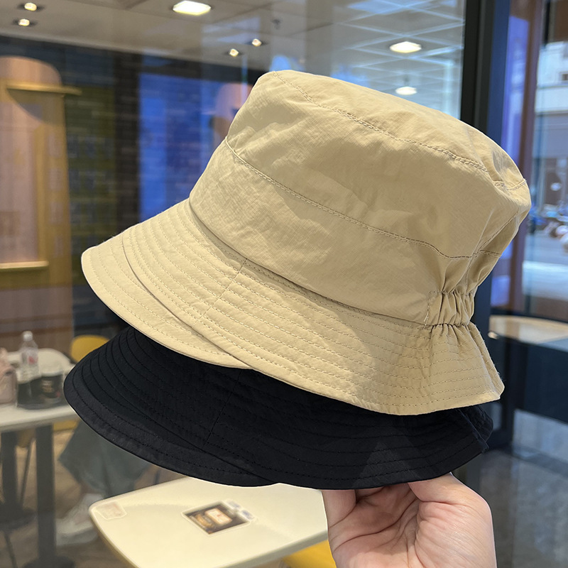 Sombrero de pescador de protección solar para mujeres 2024 nuevo estilo de estilo de moda con bordes anchos y una parte superior plana, sombrero de sol casual universal