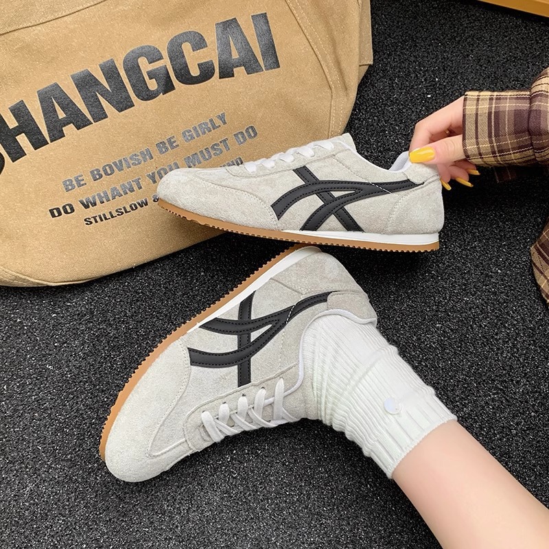 Zapatillas de entrenamiento alemanas 2026 para mujer, nuevo estilo versátil para primavera y verano, zapatillas retro A-gan, suela plana, hacen que los pies se vean más pequeños, calzado deportivo informal.