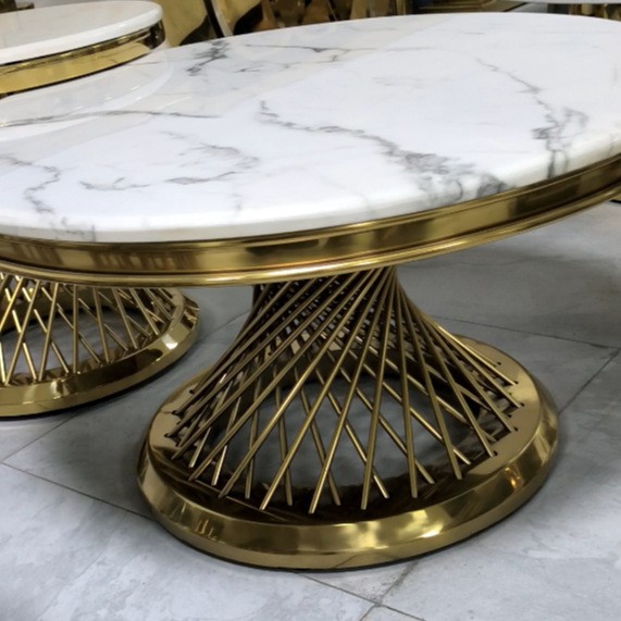 Mesa de té de mármol de acero inoxidable combinación de varios lados de la sala de estar simple mesa de hotel de metal hueco nido de pájaros titanio oro