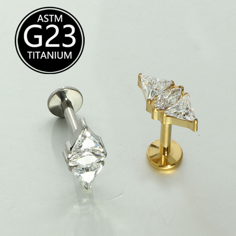 Silver pointed spike labret stud material detail