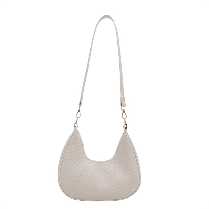 Bolsa de mujer de color sólido 2025, tendencia de primavera, nueva bolsa de brazo coreana tejida, bolso de hombro casual.