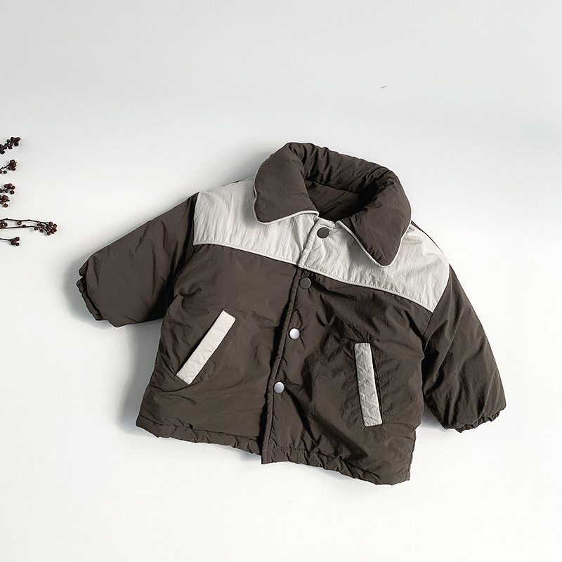 Hombres y niñas de algodón 2025 invierno nuevo chaqueta de algodón para niños coreano engrosado calentamiento ropa superior de niños al por mayor