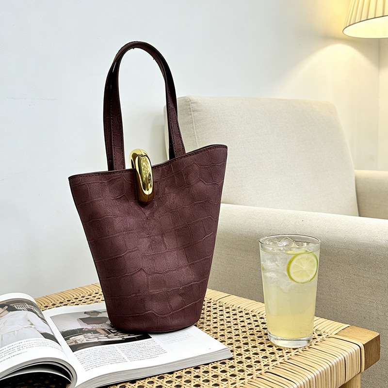 French Niche Bucket Bag Jacquemus, Unique Asymmetrical Leather Basket-Style Handbag with Matte Gold Buckle French Niche Bucket Bag Jacquemus, Unique Asymmetrical Leather Basket-Style Handbag with Matte Gold Buckle