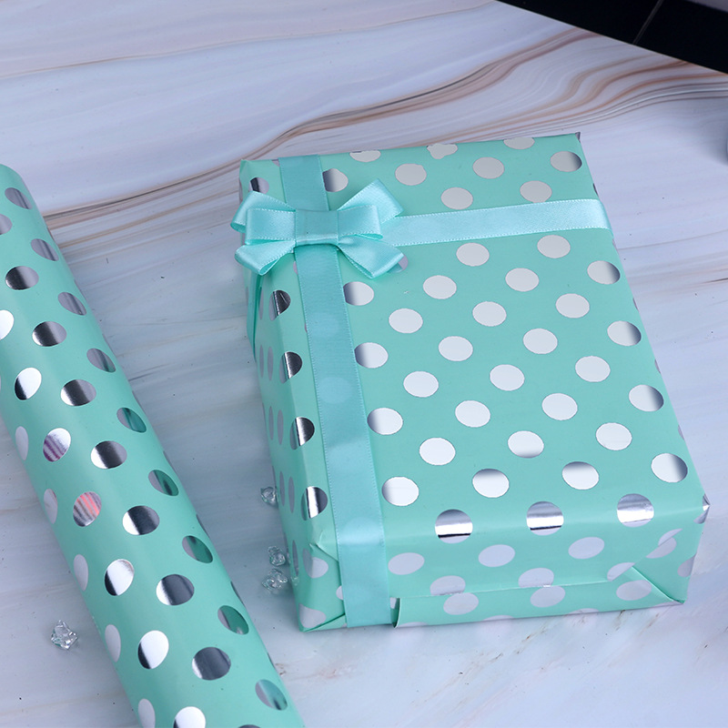 Regalo de vacaciones papel recubierto papel de embalaje fábrica al por mayor regalo de cumpleaños papel de regalo de lunares dorado papel de embalaje