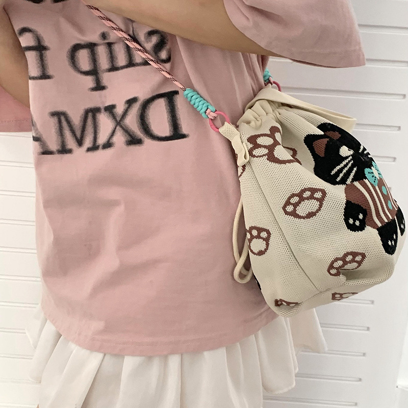 Bolsa de cinturón versátil nuevo patrón de dibujos animados nicho lindo bolso de arroz de almuerzo de cuerda bolso de cubo de mano bolso de brazo