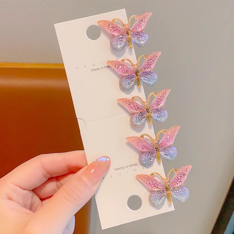 Estilo explosivo Super Fairy Symphony Horquilla de mariposa tridimensional Clip de pelo roto femenino Tocado Clip de pico de pato Horquilla para niños con sentido avanzado