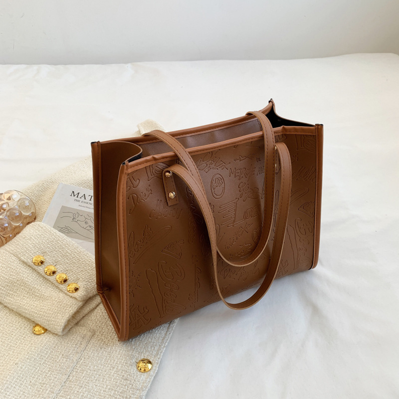 Bolsa de gran capacidad para mujeres otoño / invierno 2022 nueva moda de moda simple atmósfera bolsa de viaje de hombro japonesa bolsa especial