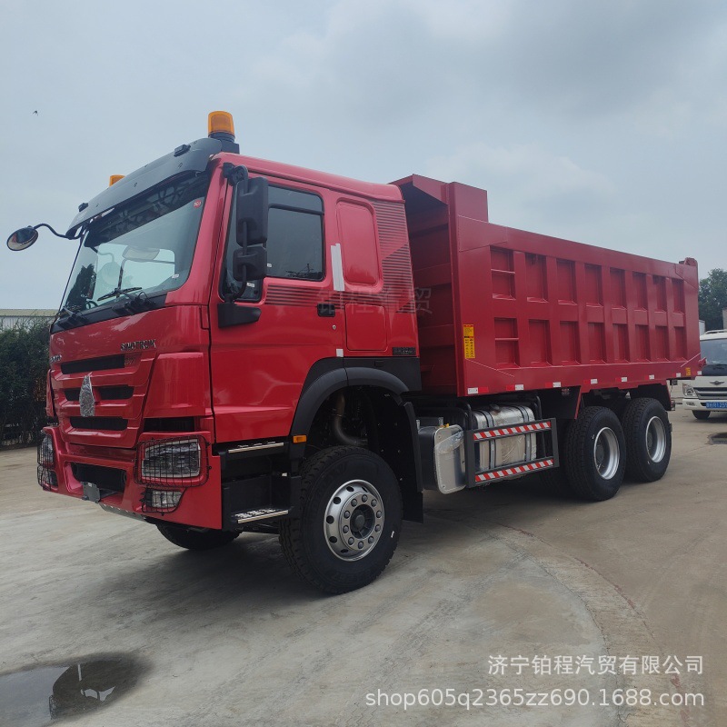 Cross-border export of a brand new China Heavy Duty Truck Howo dump truck with 430 horsepower, 5.6 cubic meters cargo box, 6x4 rear eight-wheel drive