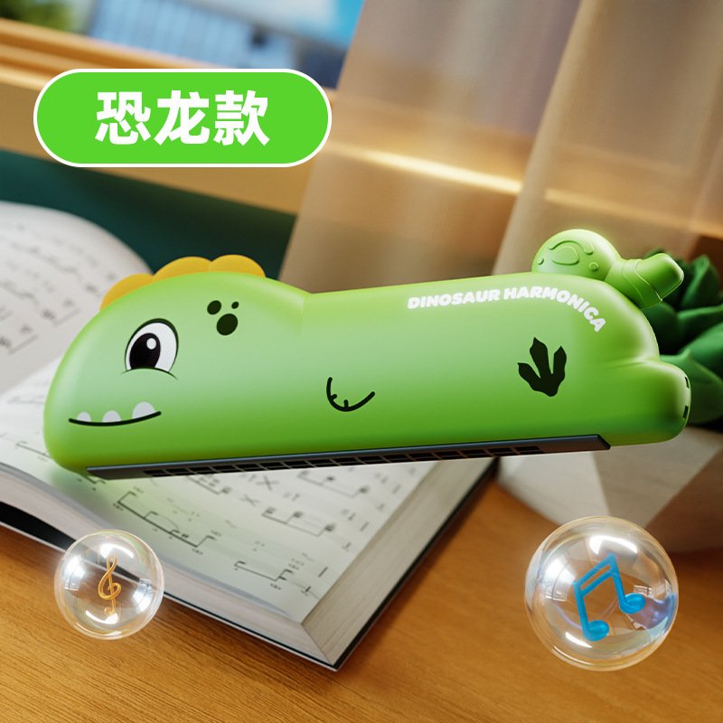 子供は大きいサイズの口オルガンを吹くことができます。|undefined