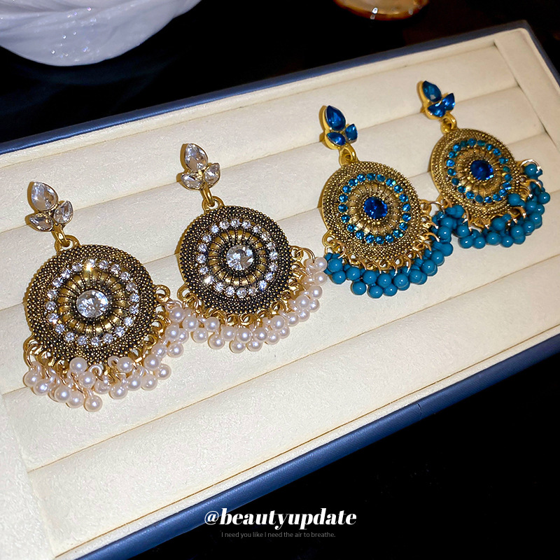 Pendientes de borla de gota de agua de diamantes de estilo étnico Pendientes de diseño de viajes de nicho retro femenino Pendientes de lujo ligero de alta gama