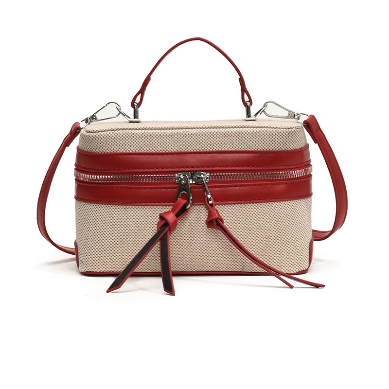 2025 nuevo nicho de diseño retro color contrastante empalme bolso de mano personalidad viaje elegante mochila de hombro