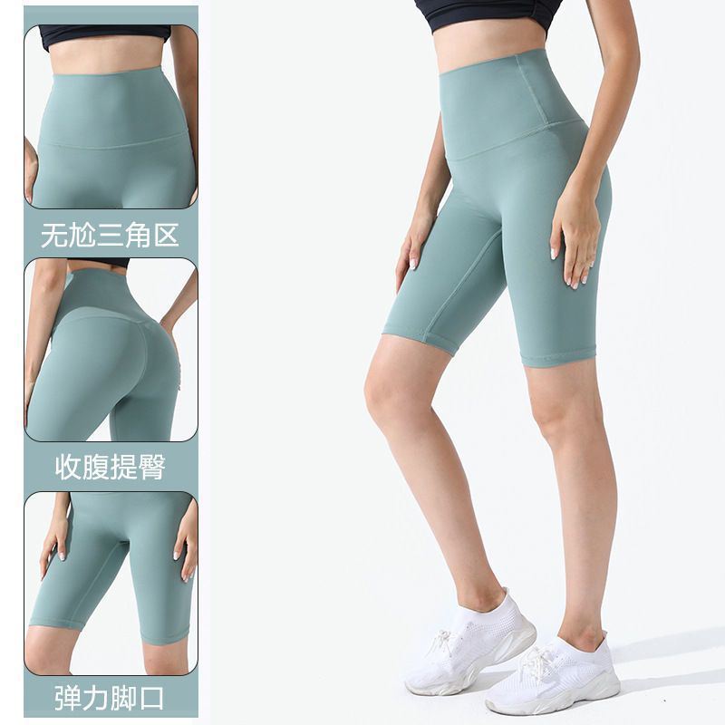 Pantalones cortos desnudos de mujer elásticos apretados para elevar las caderas de cinco puntos pantalones deportivos de secado rápido succión de sudor entrenamiento para correr fábrica de comercio de ping