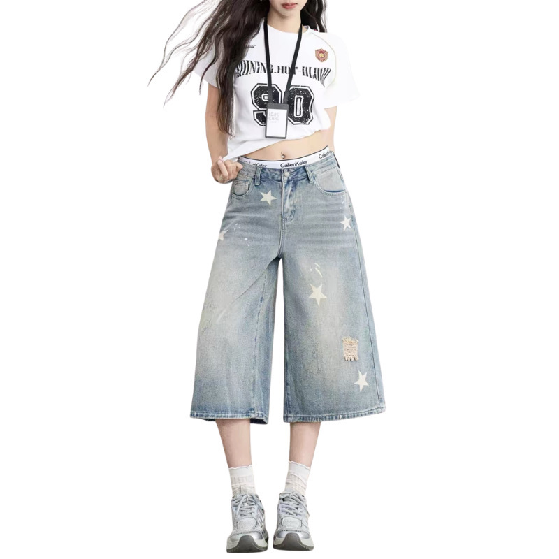Customized OEM/ODM denim factory: Women's distressed cropped jeans in American retro style with star print, ripped, slimming, straight cut Customized OEM/ODM denim factory: Women's distressed cropped jeans in American retro style with star print, ripped, slimming, straight cut