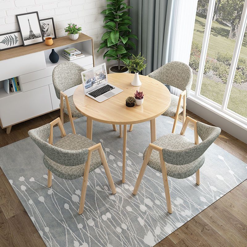 Light wood grain single table + floral linen chair