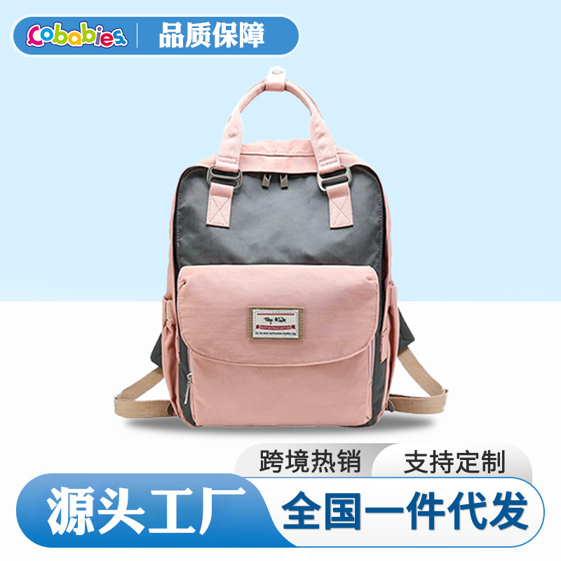Multifunctional diaper bag backpack with multiple compartments, large capacity, suitable for mothers and babies, and insulated for baby bottles.