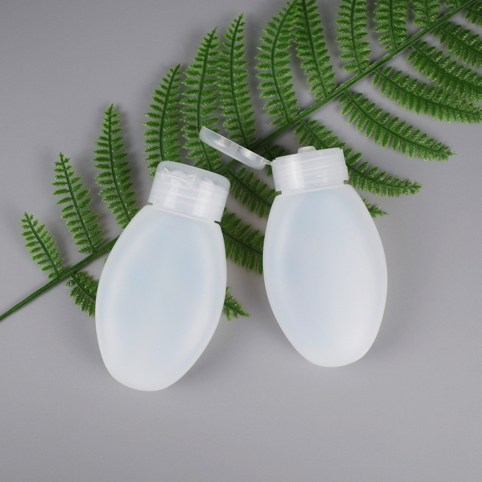 供应PE扁瓶100ML异形塑料瓶乳液分装瓶量大优惠