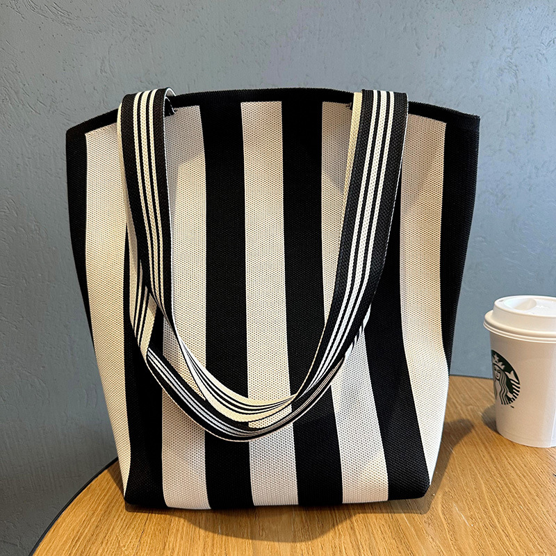 Nuevo contraste de color geométrico bolso de hombro de las mujeres de alto grado versátil simple de gran capacidad de punto a rayas bolso de cercanías