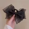 Crab pin with bow