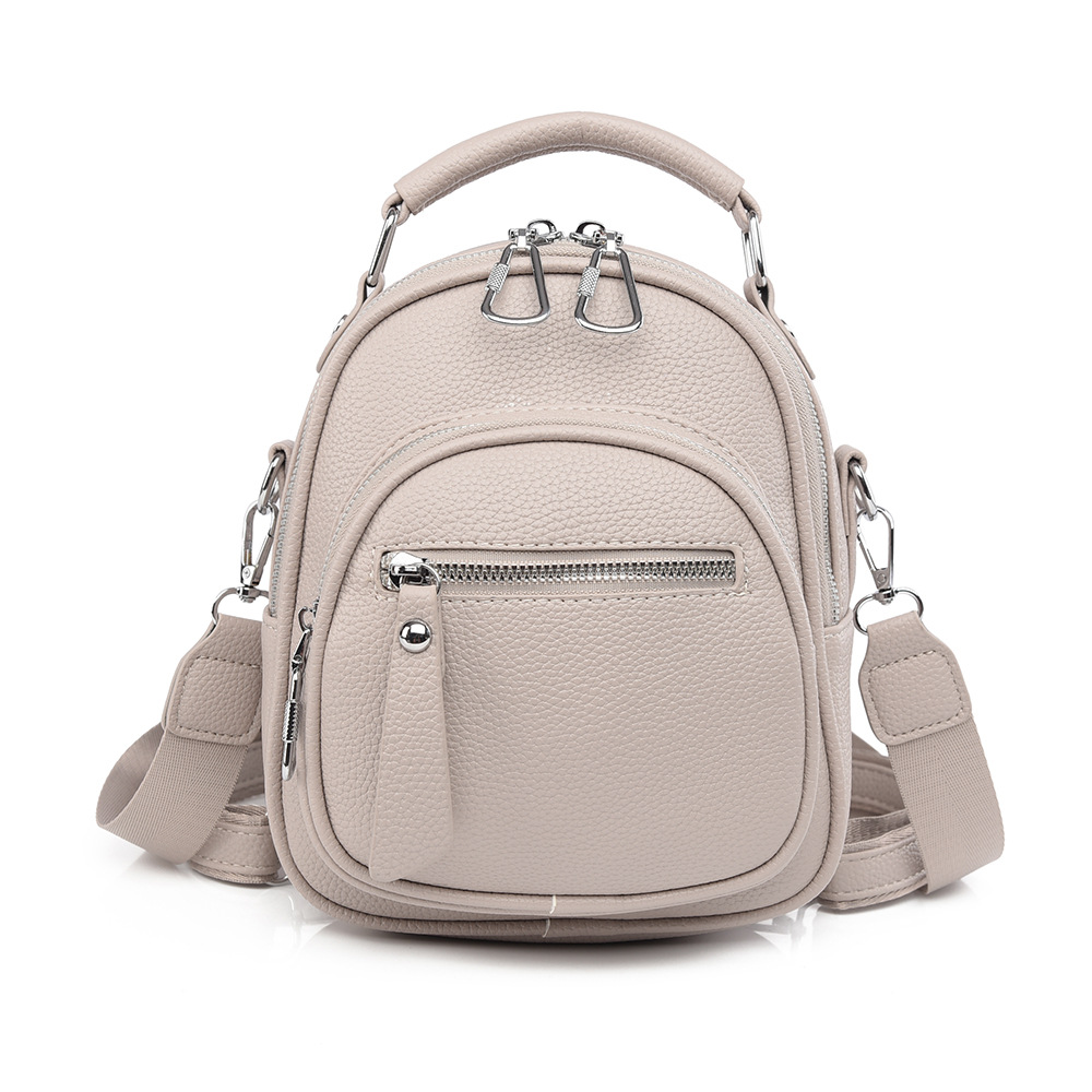 Bolso de mujer de cuero suave de textura 2025, nuevo estilo de moda, mochila de estilo exterior, bolso de moda multipropósito.