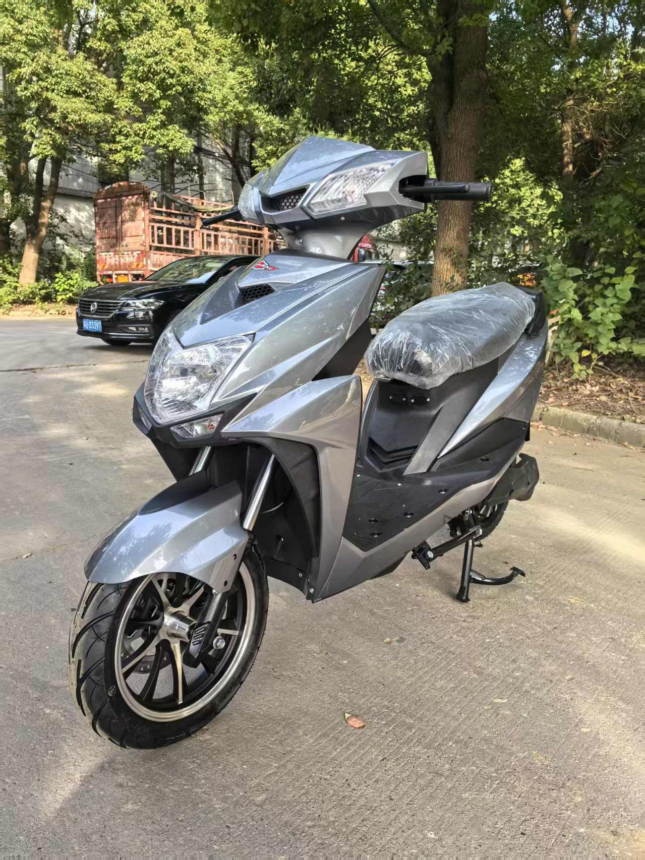 Nuevo pedaleos de motocicleta de batería de litio de litio fabricantes mayoristas de larga duración de motocicleta eléctrica de dos ruedas