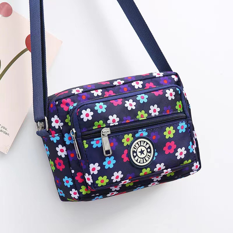 Bolsa de tela de flores bolsa de mensajero de las mujeres nueva bolsa de Madre de gran capacidad bolsa de hombro individual de mediana edad y ancianos bolsa de tela Oxford bolsa