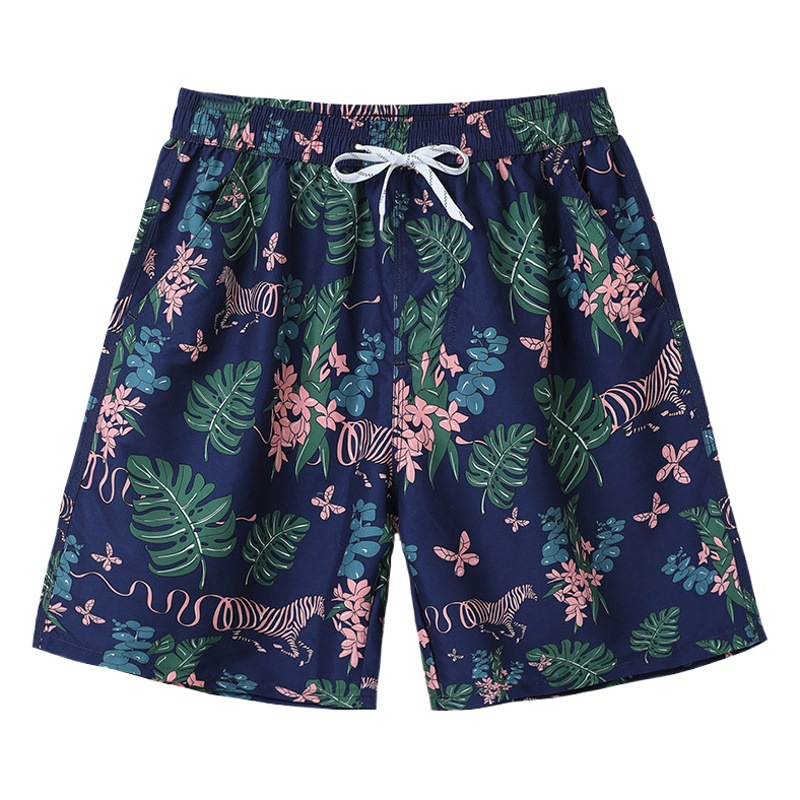 Venta directa de fábrica nueva pareja de vacaciones de secado rápido pantalones de playa versión suelta de los hombres de natación surf pantalones cortos de secado rápido