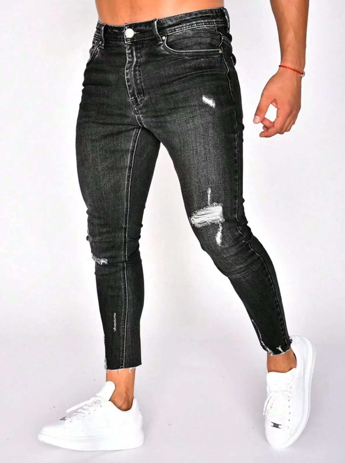 Jeans slim fit uomo strappati elastici pantaloni in denim_voghion.com