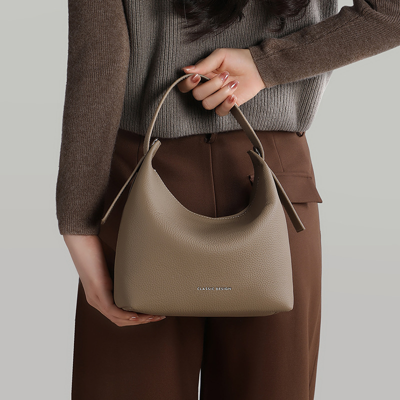 Bolso de mujer 2026 nuevo bolso de mujer verano de cuero bolsa de mano cesta de moda versátil mochila de hombro
