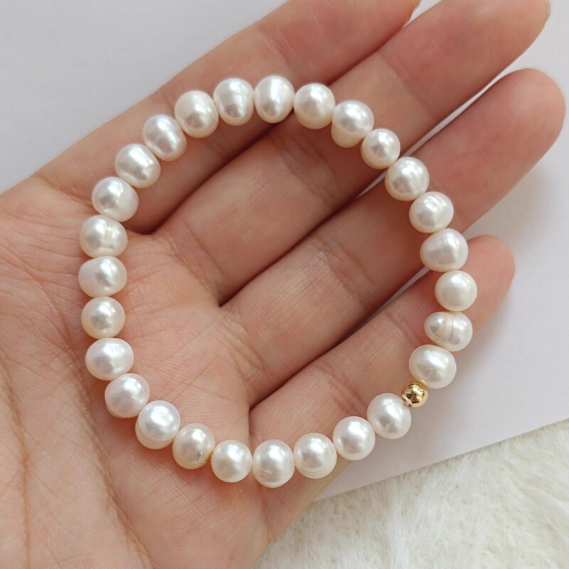 Great value for money! Natural freshwater pearl bracelet with imported elastic cord, non-fading, genuine pearls, simple and elegant for women