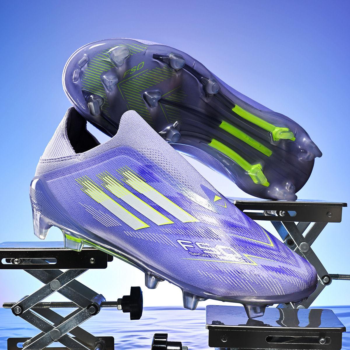 Zapatos de fútbol infantiles transfronterizos, zapatos de fútbol adolescentes masculinos, estudiantes, zapatos de fútbol femeninos TF, zapatos de fútbol aggravar al por mayor