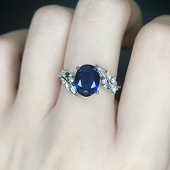 廠家直銷葉子邊仿藍寶石戒指女時尚氣質橢圓粉鑽祖母綠可調節鑽戒