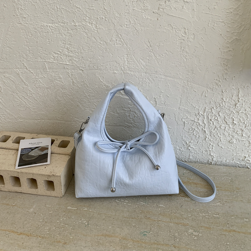Bolsa de mano de arco dulce coreano, exquisito cinturón de nubes, bolso de mochila encantador, fresco y versátil, bolso de moda