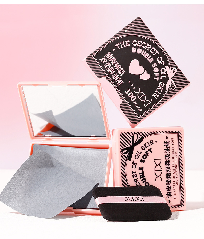 xixi Oil-absorbing Paper comes with a powder puff, touch-up makeup mirror, and is a portable oil-removing and oil-absorbing facial tissue that is both oil-controlling and refreshing undefined