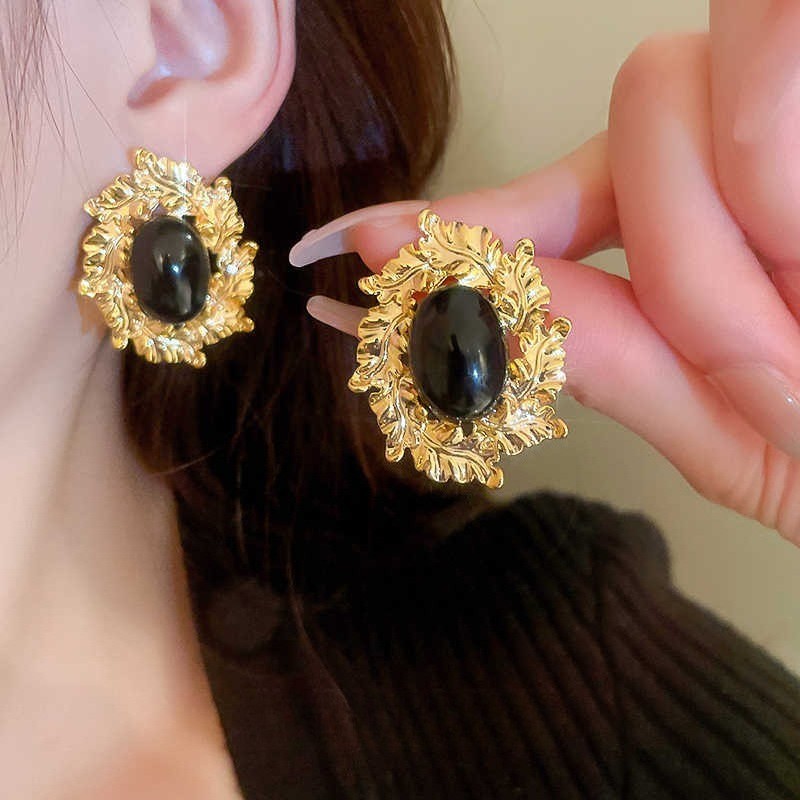 Pendientes de aleación coreanos Pendientes largos de alta calidad de perlas Pendientes de puesto al por mayor transfronterizo Pendientes exagerados de lujo ligero Mujeres