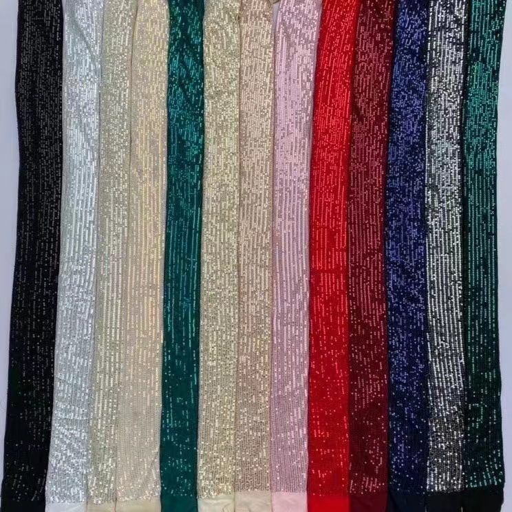 Tela de malla no elástica de poliéster bordado Hoja 3 lentejuelas de pelo Comercio exterior textil vestido de novia tela multicolor malla de lentejuelas