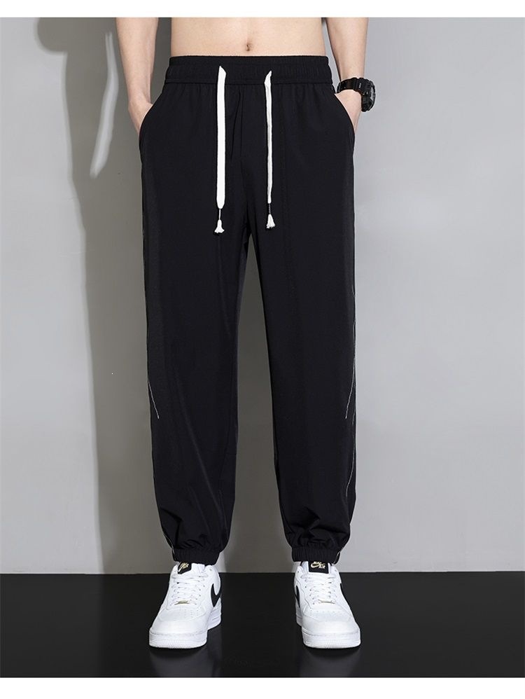Quần jogger nam bo gấu dài ống bó, chất liệu băng lụa mỏng mùa hè, form rộng thùng thình, phong cách thể thao, nhiều size từ M đến 8XL — màu đen, màu xám đậm, màu kaki chi tiết 13
