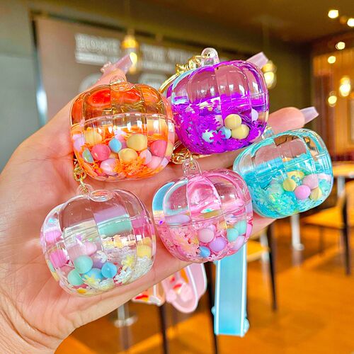 Oil-infused luminous pumpkin quicksand bottle key chain car pendant cartoon creative doll machine grab machine school bag gift pendant