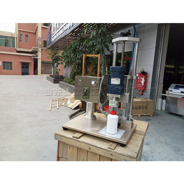 直销塑料瓶封口机 半自动洗发水拧盖机 手扣式喷枪瓶盖锁盖机现货