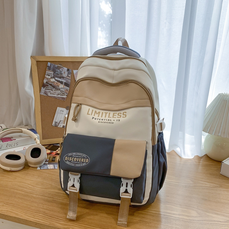 Mochilas escolares de alto valor facial nuevas estudiantes de primavera 2025 moda ligera y viajes al aire libre de gran capacidad con bolsos de hombro