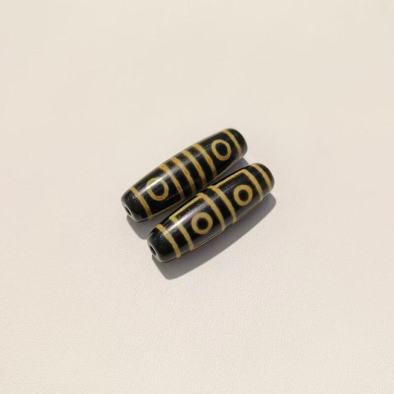 メーカー歯黄包糊九眼12 × 38mm天珠歯黄風化古法包糊瑪瑙天珠【a級】|undefined