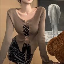性感辣妹圆领镂空交叉系带长袖针织衫女秋季新款纯欲短款针织上衣